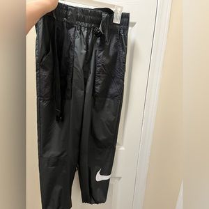 Nike wind track pants with buckle